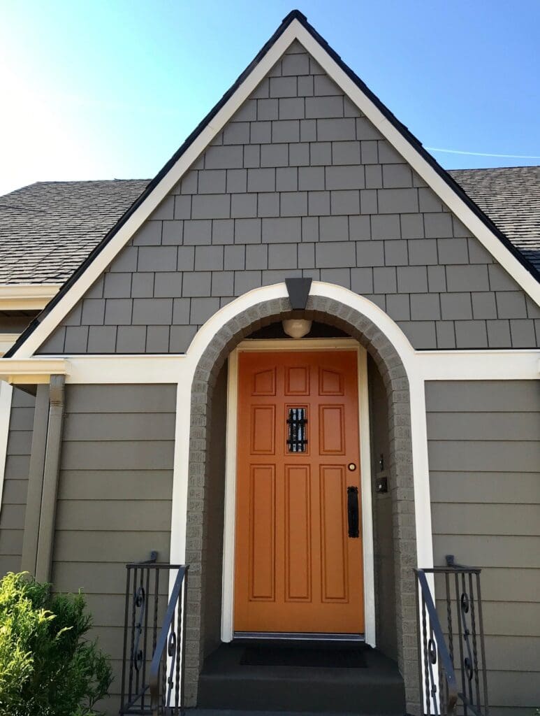 View of a home's front entrance enhanced with slate gray Hardie Plank Shingle Siding